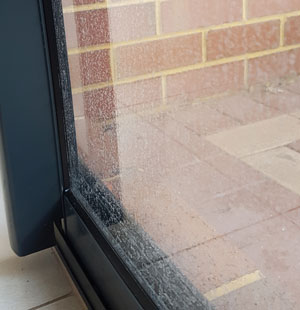 Hard water staining on sliding door